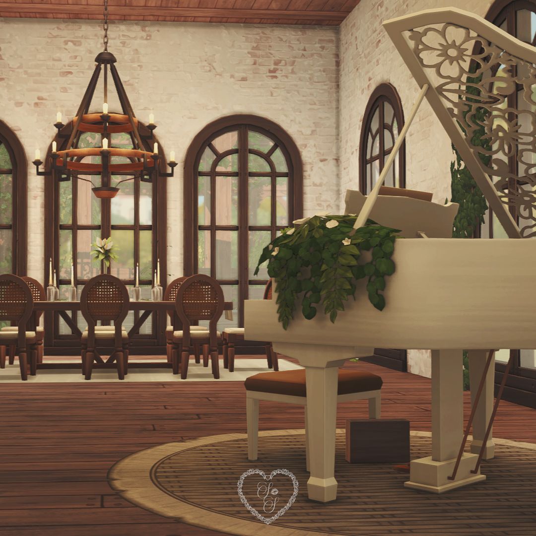 Elegant dining room with a floral grand piano, wooden chandelier, and long dining table framed by arched windows.