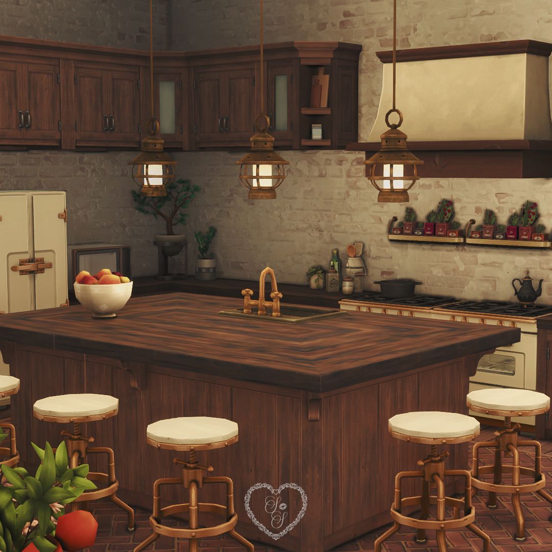 Rustic kitchen in with a large wood island, copper pendant lighting, and vintage-style appliances.