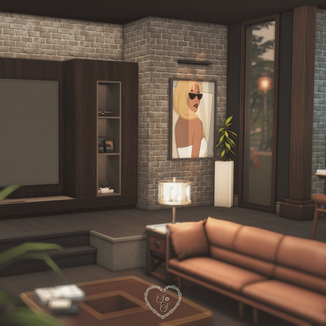 A flirty and glamorous artwork of a blonde woman in sunglasses hangs on an exposed brick wall beside tall windows and modern décor.