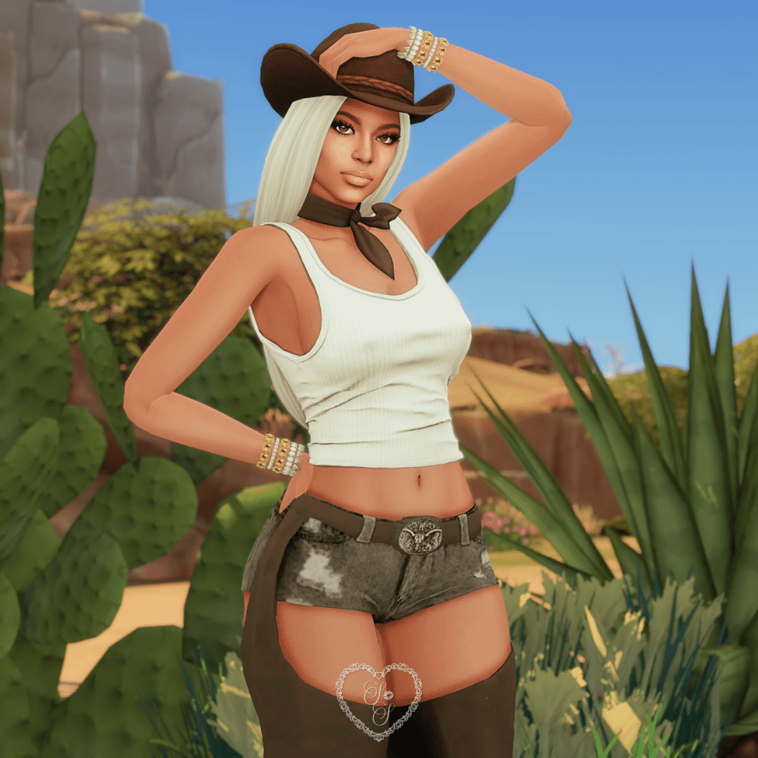 Sims 4 Beyoncé posing with one hand on her hat, dressed in a white tank, chaps, and shorts, set in a sunlit desert with cactus behind her.