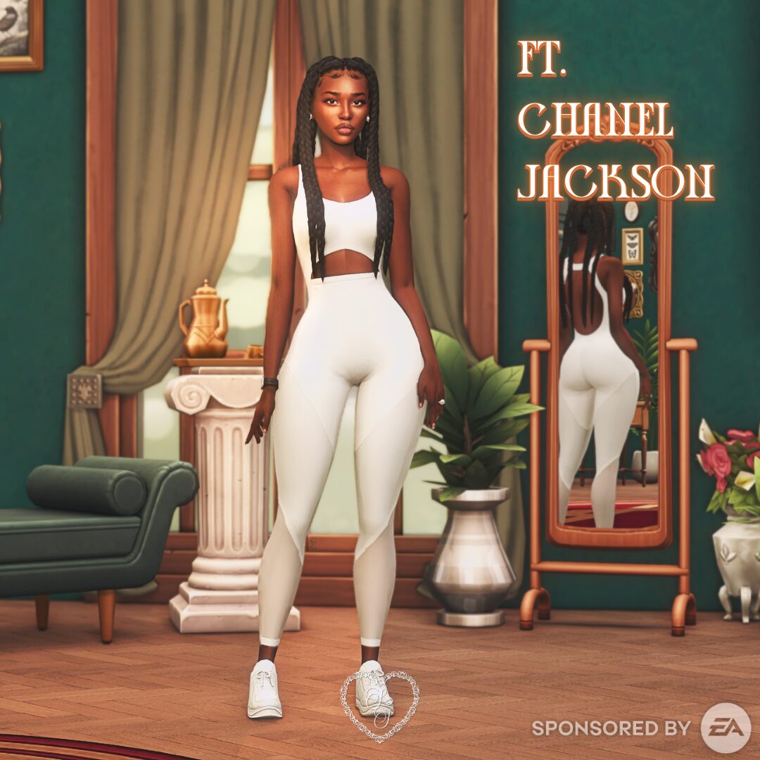 Chanel Jackson stands confidently in white athleisure—high-waisted leggings and a matching crop top—with her reflection visible in the background mirror and plants framing the shot.