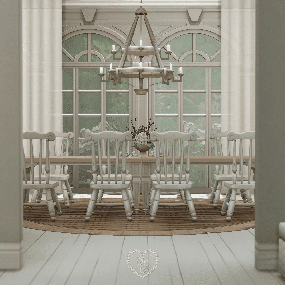 A dining space with a long wood table, white chairs, and a chandelier set against arched windows.