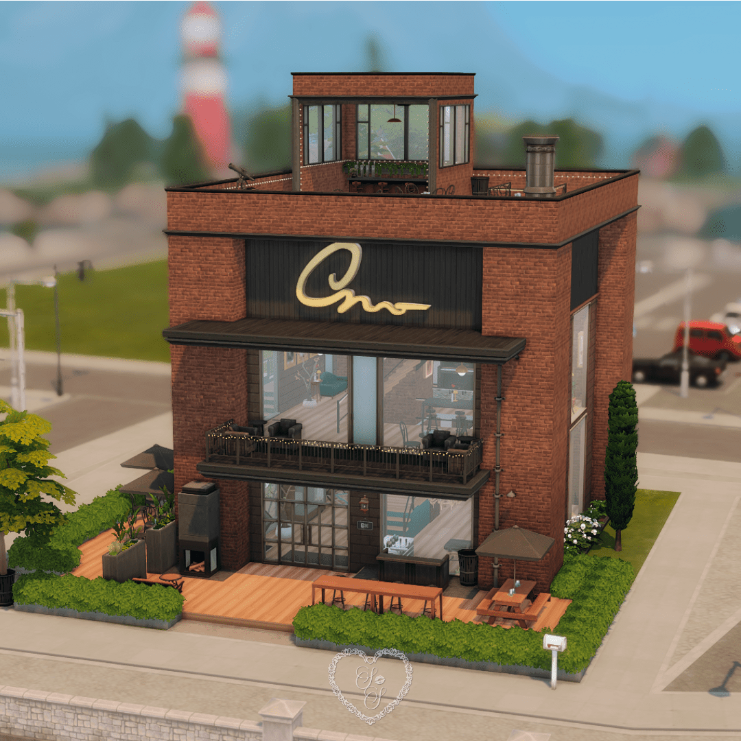 A stylish brick building with large windows, rooftop bar, and bold signage, showcasing the front exterior of Ink and Reverb in Nordhaven.