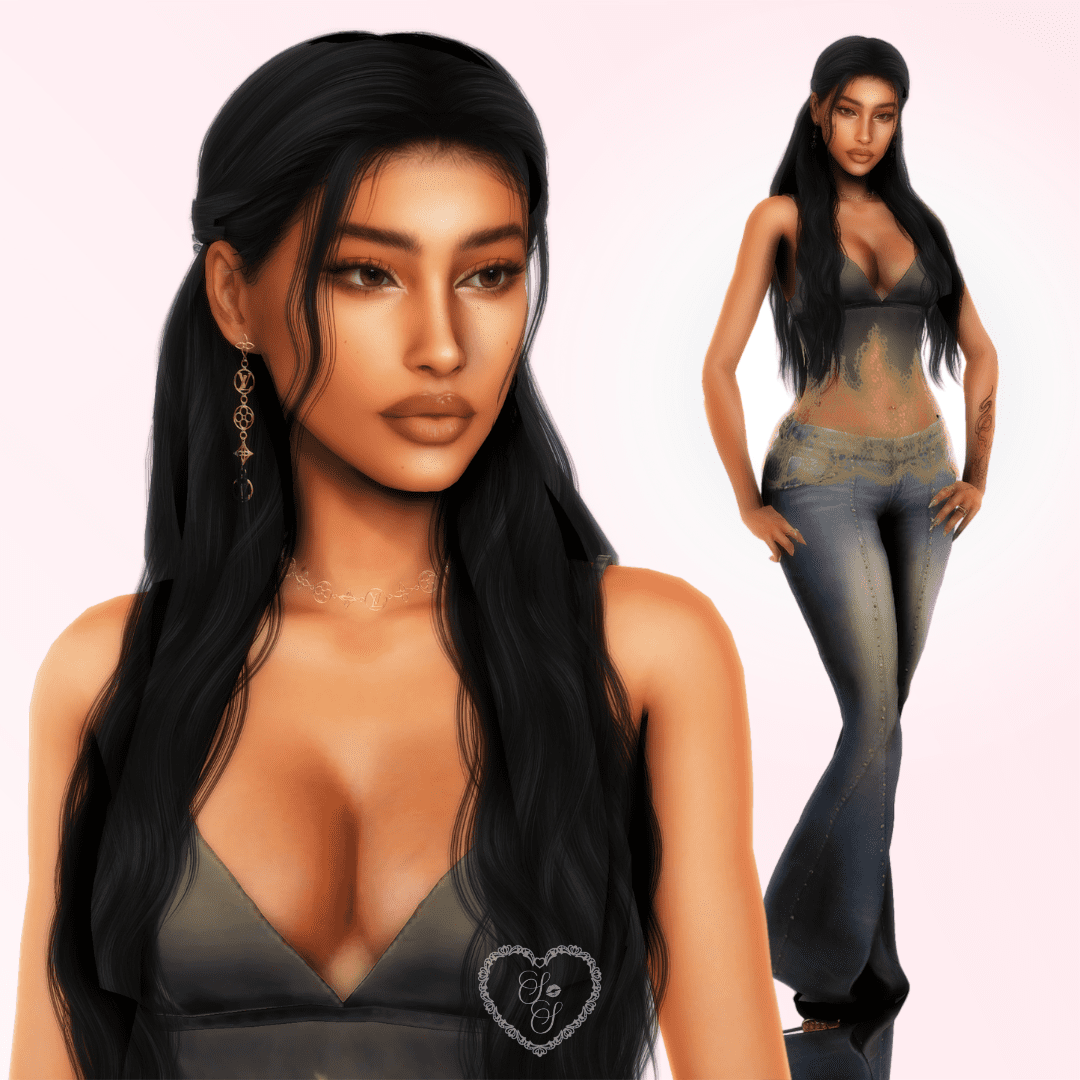 Samaya Singh poses with her hand on her hip, wearing flared jeans and a sheer top, gold earrings peeking through her dark waves.