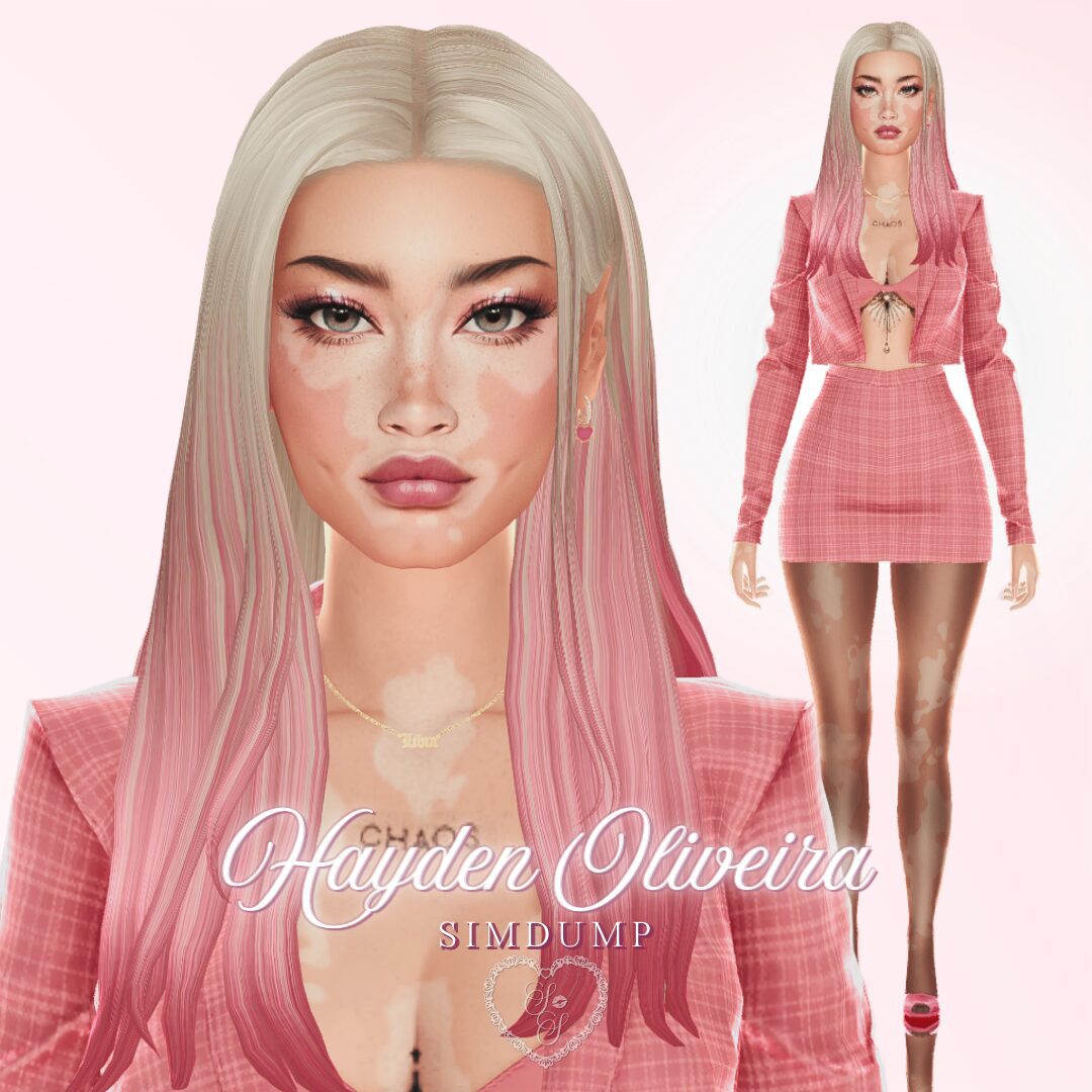 Hayden Oliveira stuns in a pink plaid matching set with ombré hair and soft glam makeup, standing confidently with hands on hips.