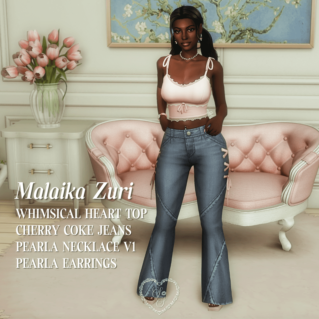 Malaika wears a cropped tie-top and wide-leg jeans with bow accents, styled with soft glam hair and pearl jewelry in a pastel sitting room.