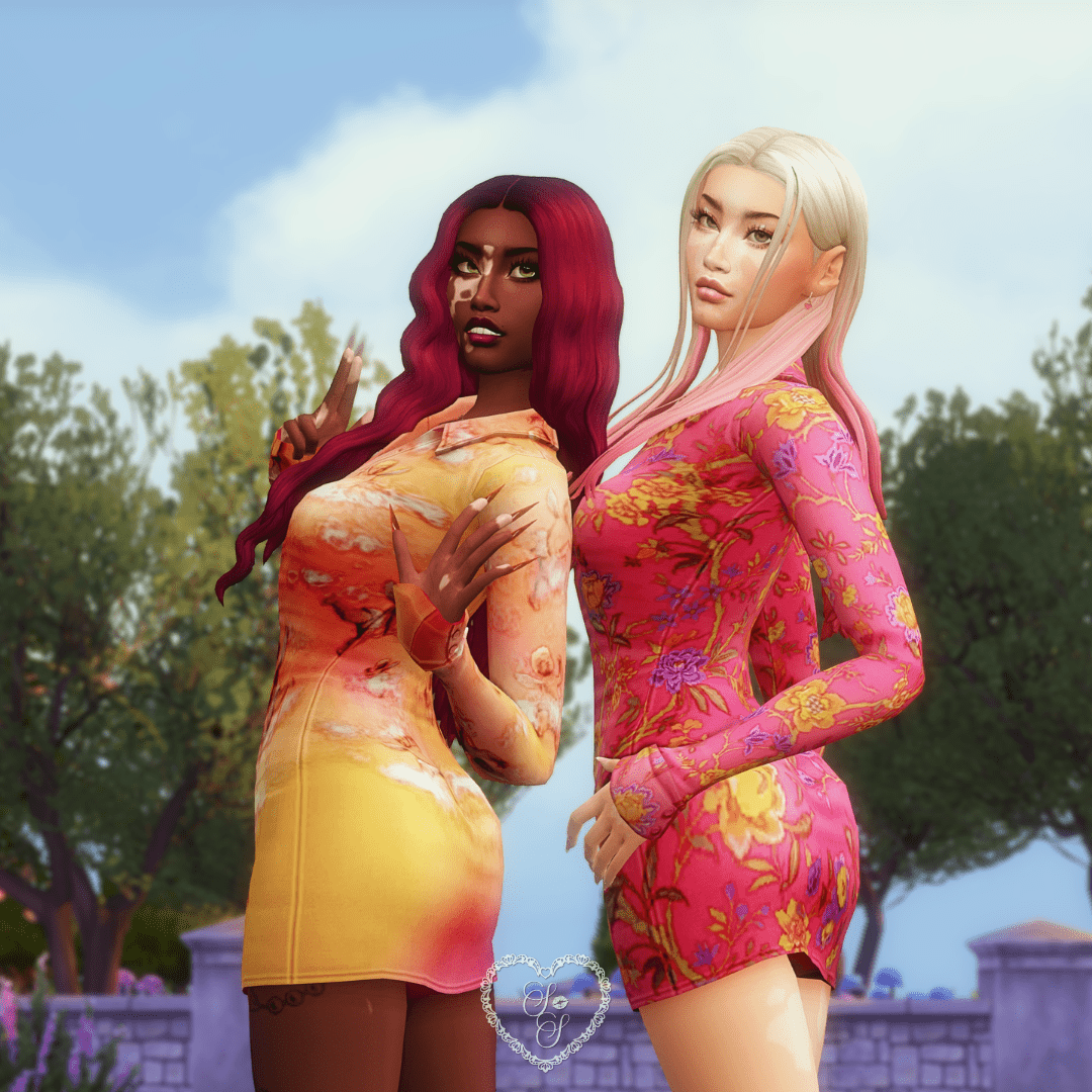 Zahra and Hayden pose together in the Matilda Dress, showing off vivid ombre and floral prints.