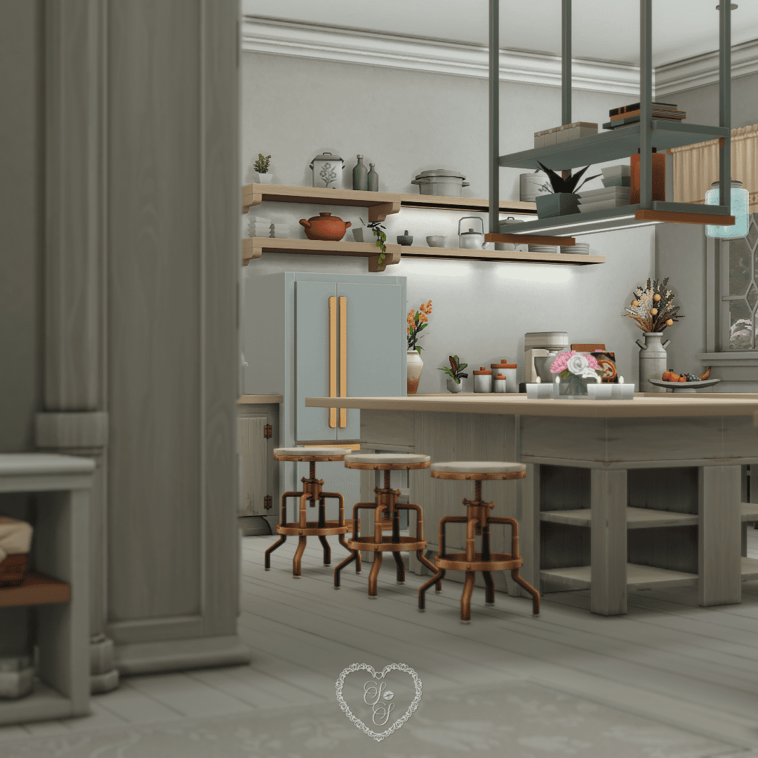 A chic farmhouse-inspired kitchen with a pale blue fridge, warm-toned stools, hanging storage, and pastel floral accents.