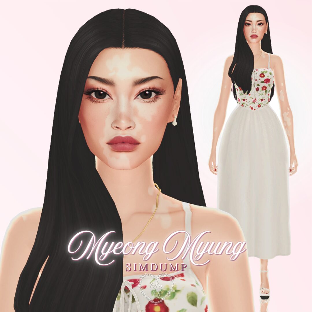Myeong Myung exudes elegance in a floral embroidered dress with pearl earrings, long straight black hair, and visible vitiligo.
