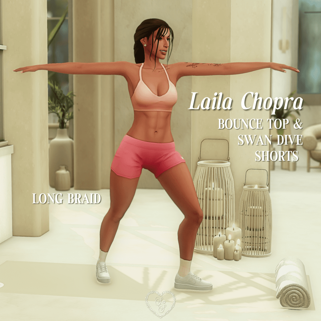 Sim Laila Chopra stretches in a coral pink bounce top and swan dive shorts, with a long braid hairstyle. Her sporty yoga outfit pops against the candle-lit beige background.