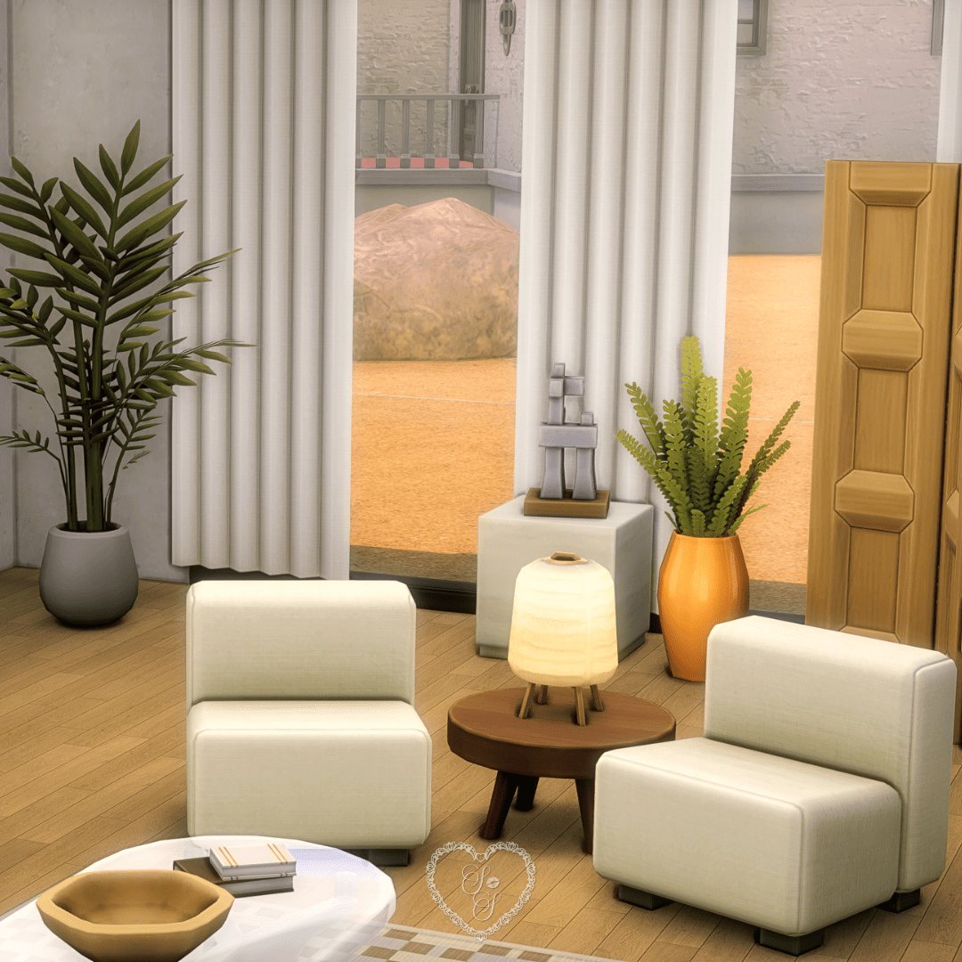 An inviting space from the Refined Living Room build, styled with lush plants, ambient lighting, geometric folding screens, and creamy upholstered chairs.