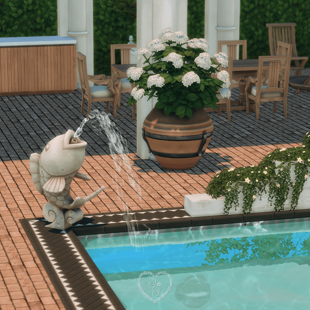 Detail of the Classic Colonial’s elegant poolside featuring a stone fish fountain and lush floral landscaping in The Sims 4.