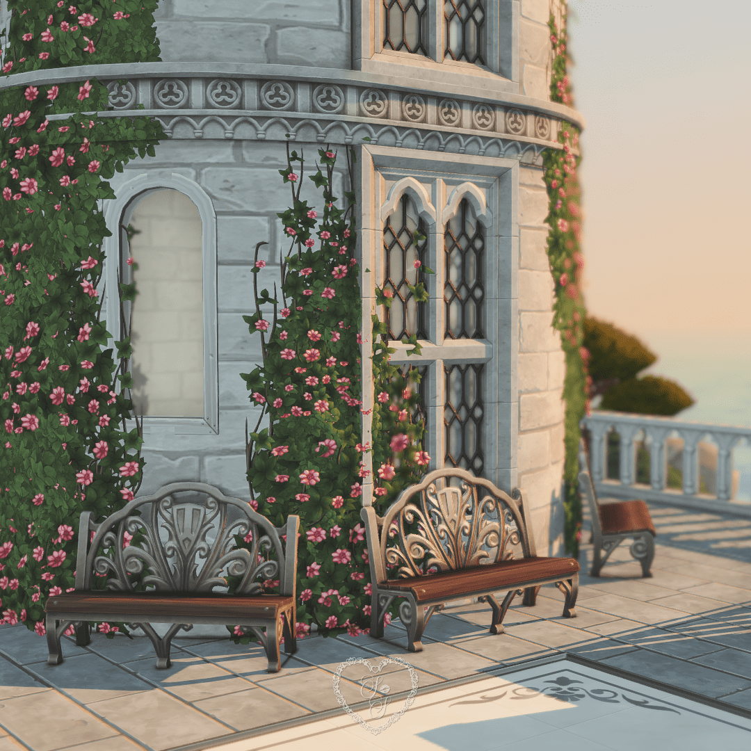 Rose-covered tower with elegant benches nestled beneath ivy in the La Vie En Rose Castle wedding lot.